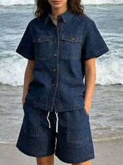 Button-up denim top and shorts set in dark blue with collared neckline and short sleeves.