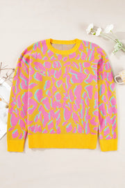 Women's crew neck sweater in yellow with abstract pink and blue leopard print.