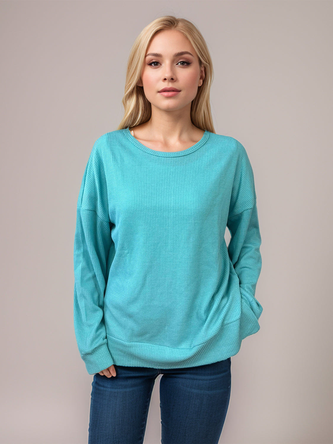 Relaxed fit crewneck waffle knit top in Pastel Blue with long sleeves and a relaxed cut.