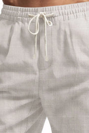 Light Gray textured cargo drawstring shorts with elastic waistband and tie.