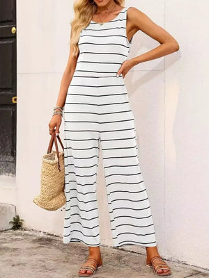 White sleeveless wide-leg jumpsuit with black stripes and a round neckline.