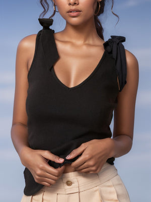 Black ribbed knit tank top with bow shoulder details and V-neck