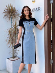 Denim patchwork short-sleeve dress in sky blue and dark blue with button-down front and pocket details.