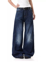 Belted wide leg jeans in washed denim with a relaxed fit and subtle vertical stripes.
