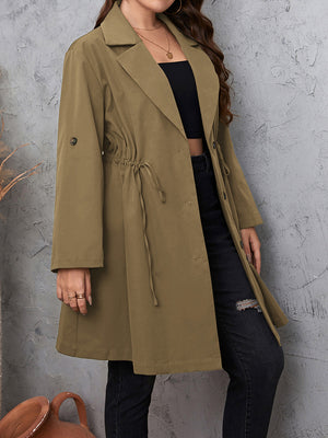 Gathered waistline trench coat in mocha with roll-up sleeves and drawstring detail.