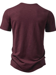 Men's burgundy cotton blend t-shirt with short sleeves and a curved hem.