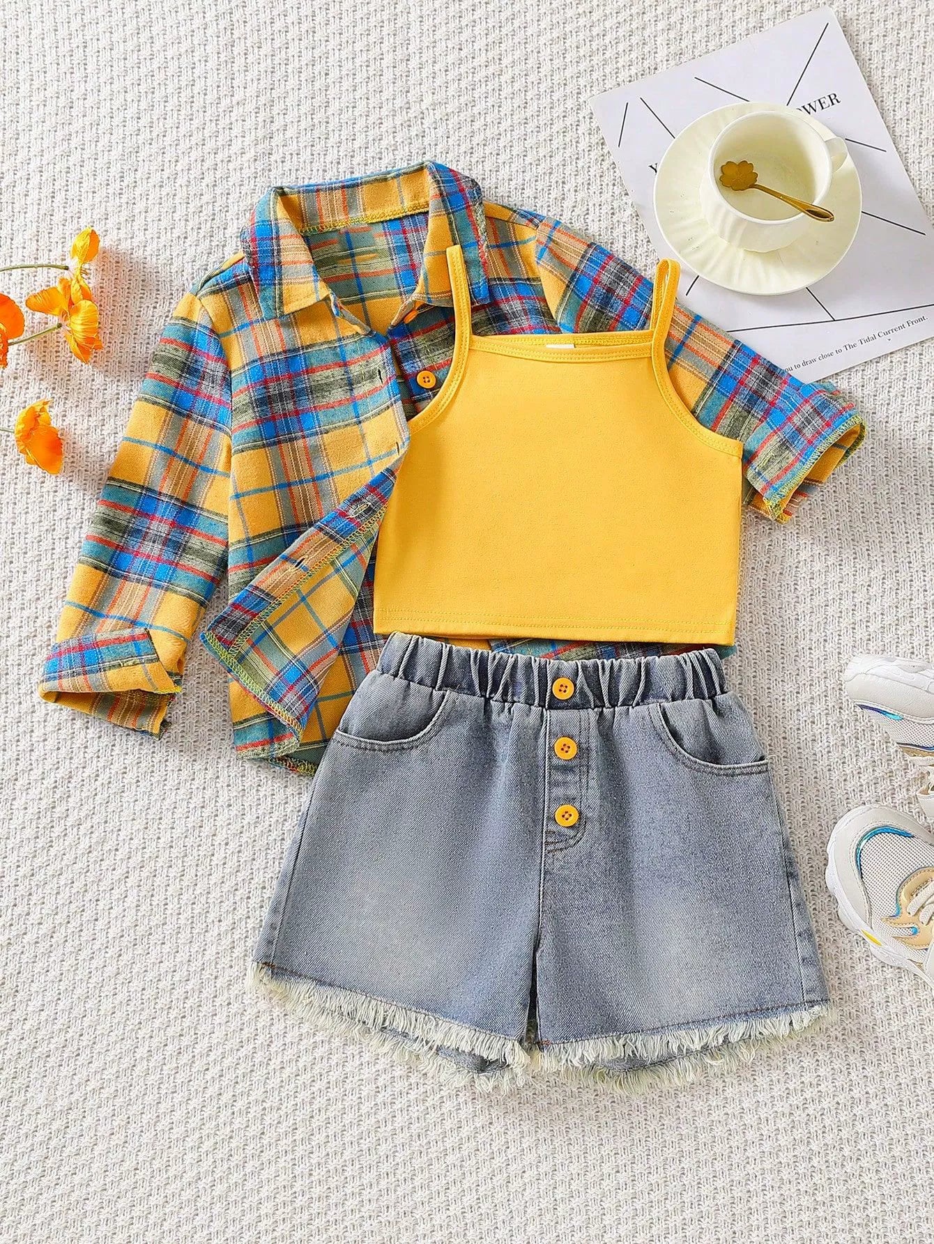 Baby girls' plaid shirt, yellow tank top, and denim shorts set with frayed hem.