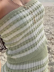 Green and white striped ribbed knit bandeau top with cutout details.