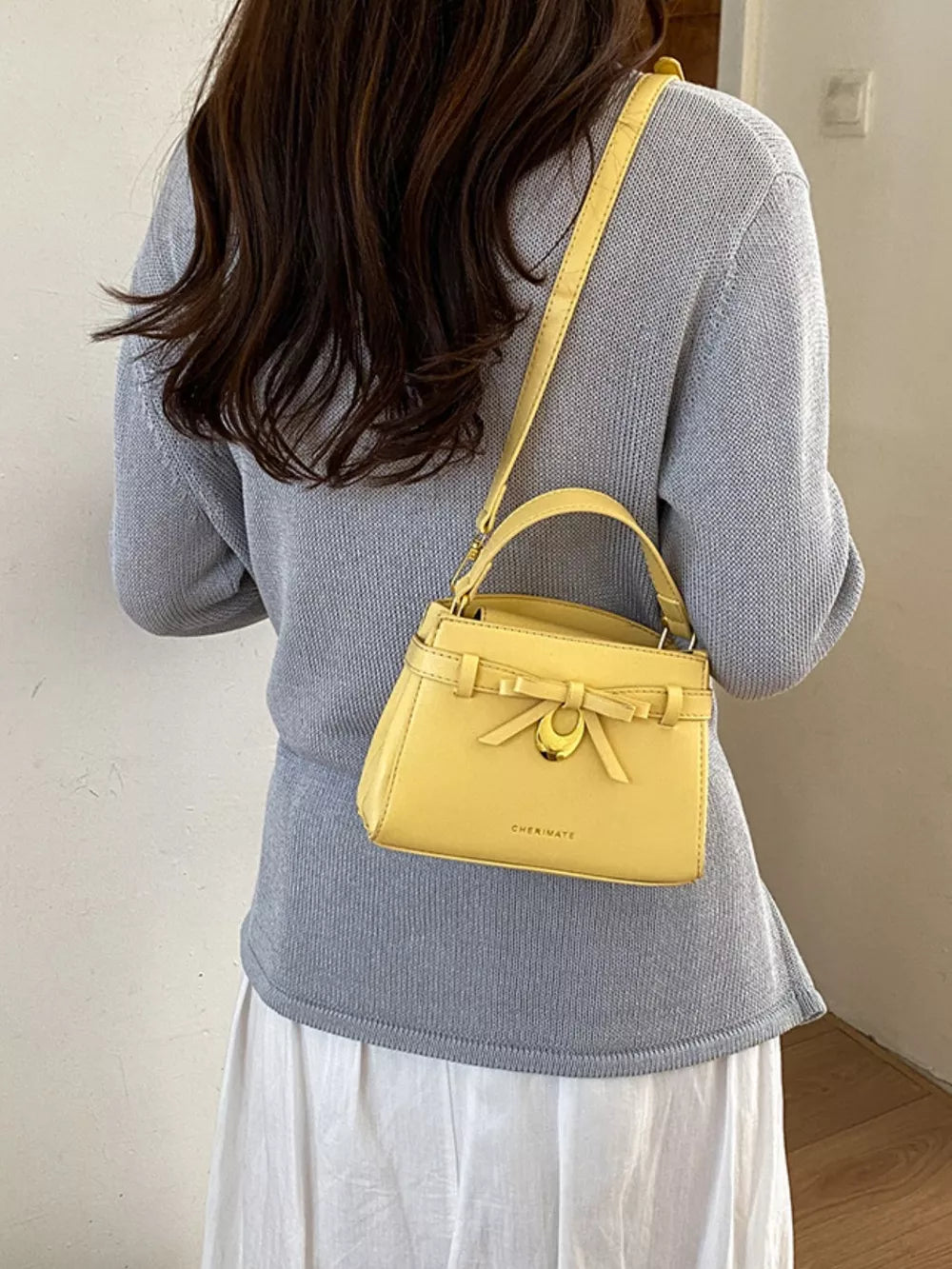 Bow Pu Leather Crossbody Bag in Yellow, front view