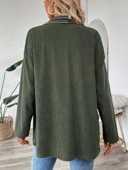 Army green corduroy overshirt with embroidered collar detail and relaxed fit.