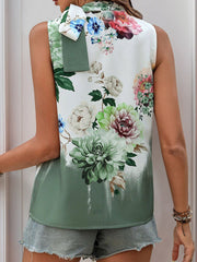 Painterly floral bow-neck sleeveless top in Gum Leaf with a green ombre hem.