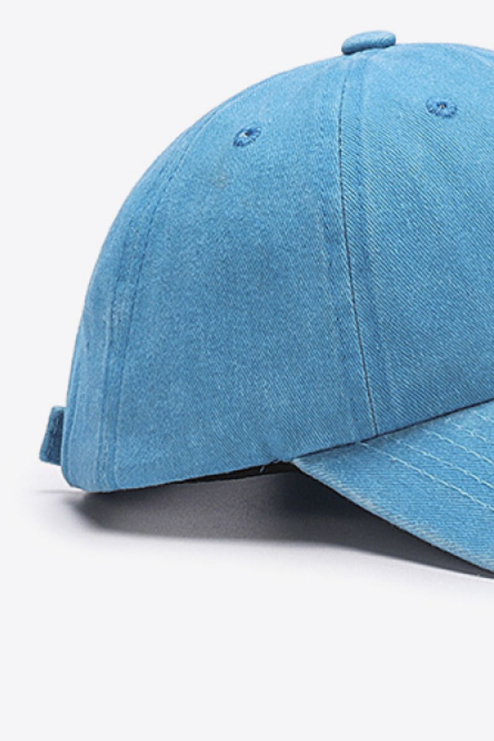 Sky blue washed cotton baseball cap with stitched details.