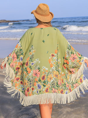 Sage floral print kimono cover-up with fringe detail and wide sleeves.