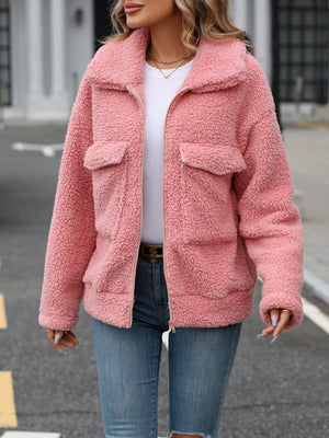 Teddy shearling zip-up jacket in burnt coral with two chest pockets and a relaxed fit.