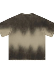 Distressed khaki t-shirt with a faded ombre effect and ripped details.