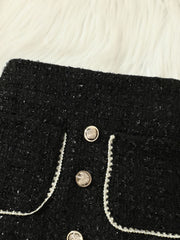 Black tweed skort with decorative buttons and trim