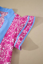 Vibrant floral midi dress with ruffle sleeves, blue collar and trim.