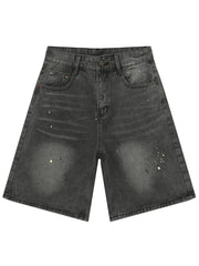 Dark wash denim bermuda shorts with paint splatter detail