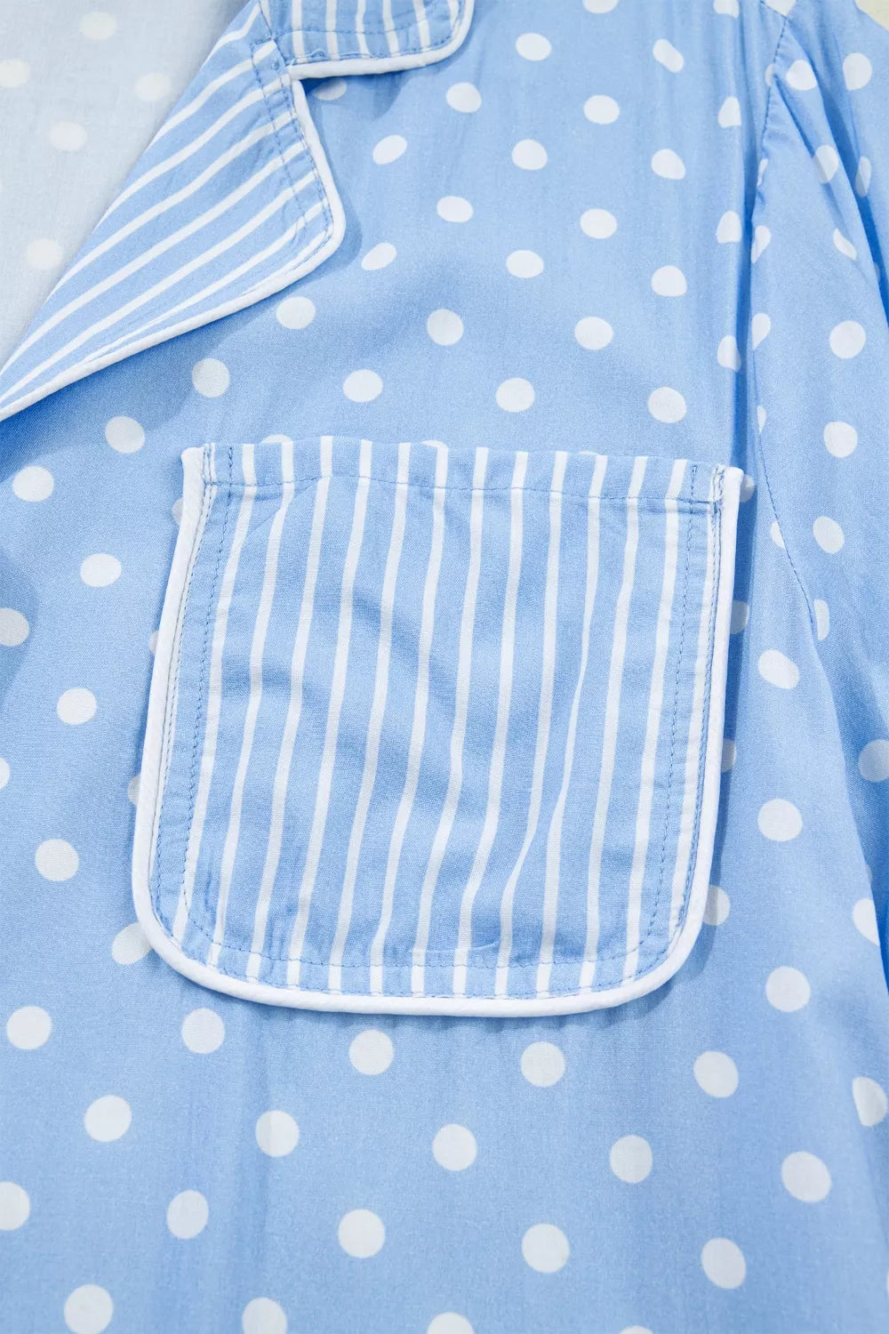 Blue polka dot viscose pajama shirt with white piping and a striped pocket detail.