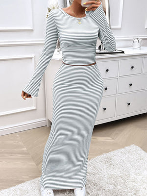 Light gray ribbed stripe crop top with bell sleeves and maxi skirt set.