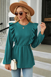 Teal textured peplum blouse with ruffle details and long sleeves.