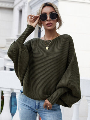 Olive boat neck ribbed dolman knit sweater with wide sleeves.