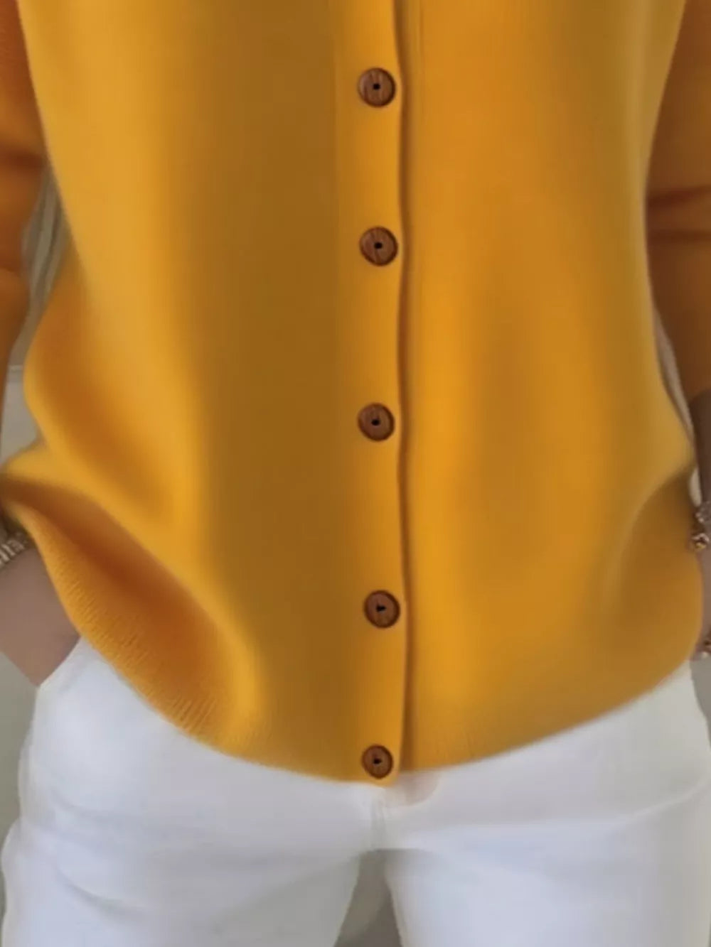 Yellow button-front knit cardigan with wooden buttons, acrylic.
