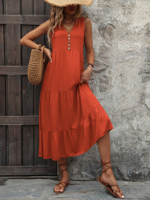Orange-red tiered midi sundress with button detail and V-neck