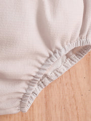 Baby cotton bloomers with elastic waistband and leg openings