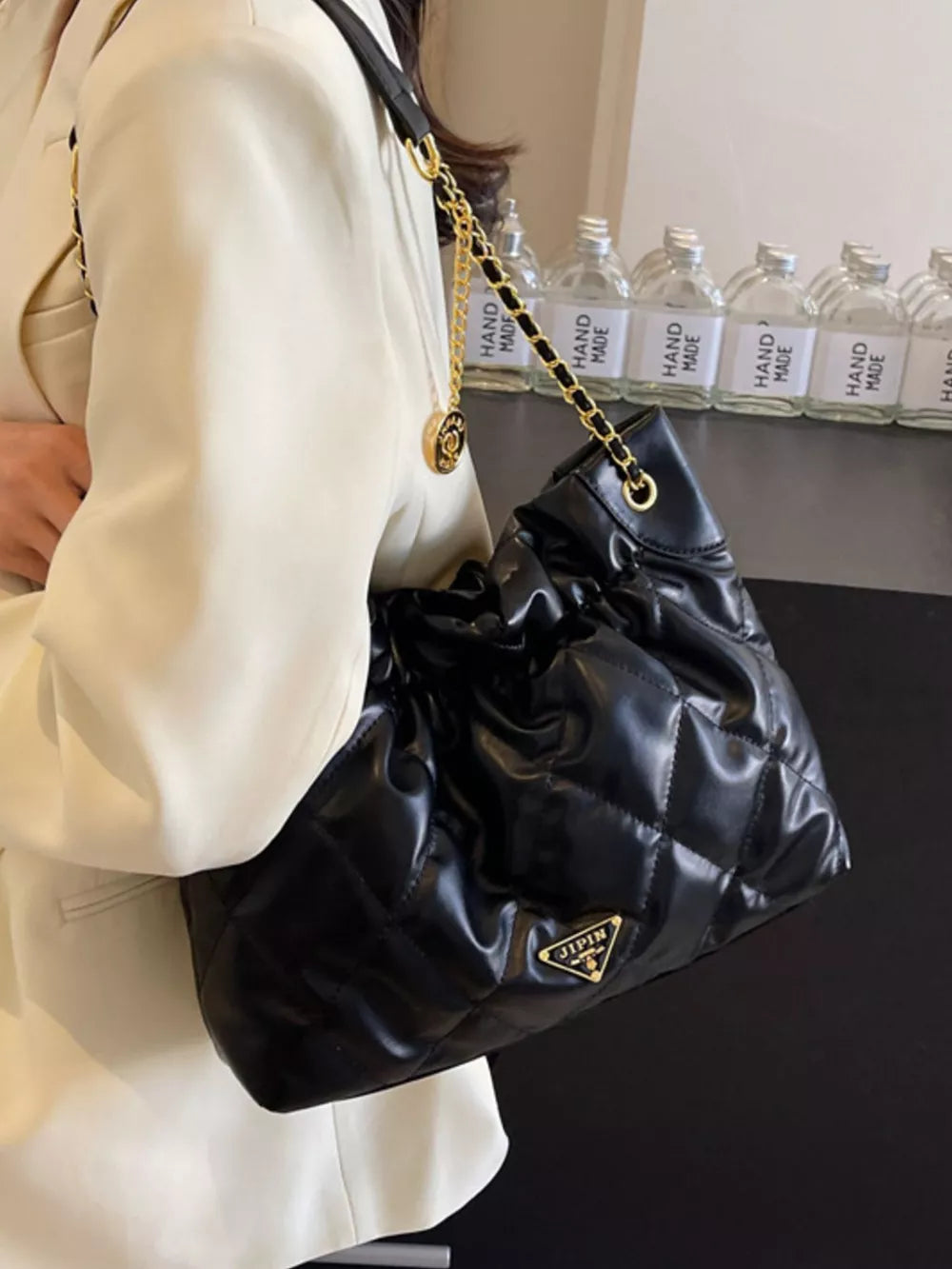 Ruched Leather Shoulder Bag in Black, side view