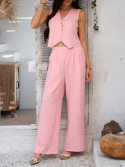 Blush pink textured crop vest and wide leg pants set with button details.