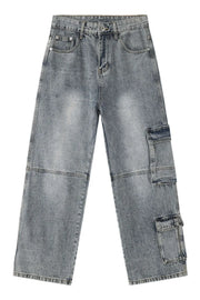 Medium wash baggy cargo jeans with distressed detailing and multiple pockets.