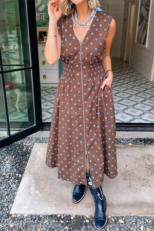 Brown polka dot midi dress with smocked waist and zipper detail