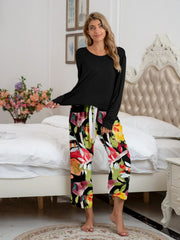 Black long sleeve top with botanical print lounge pants with tie waist