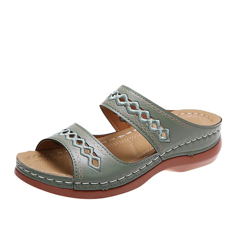 Sage embroidered strap comfort slides with open toe and cushioned footbed.
