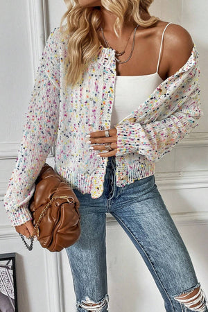 Confetti knit button-up cardigan in white with multicolor speckles, featuring a relaxed fit and button closure.