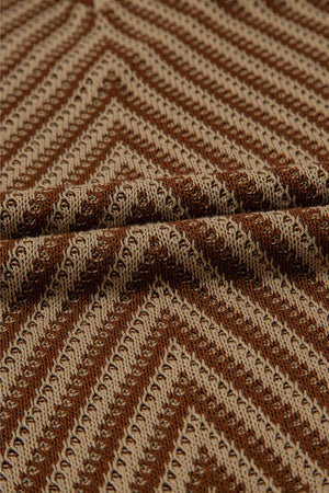 Chevron knit vest in brown and tan with open-knit texture and diagonal stripes.