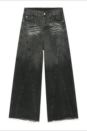 Faded panel wide-leg jeans in dark denim with a raw hem.