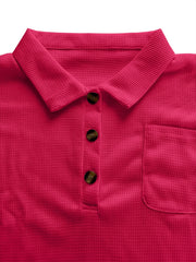 Waffle knit polo shirt in deep rose with button detail and chest pocket.
