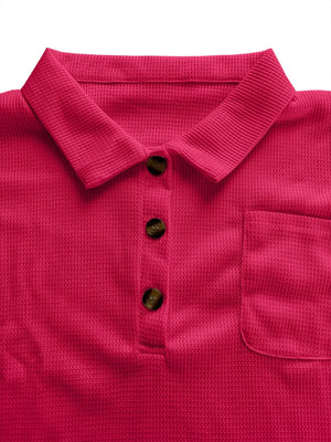 Waffle knit polo shirt in deep rose with button detail and chest pocket.