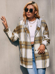 Oversized plaid shacket with hood in camel and white, featuring drawstring and button closure.