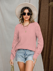 Dusty pink diamond-cut raglan knit sweater with a V-neck and long sleeves.