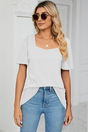 White tee with square neckline and sculpted short sleeves.