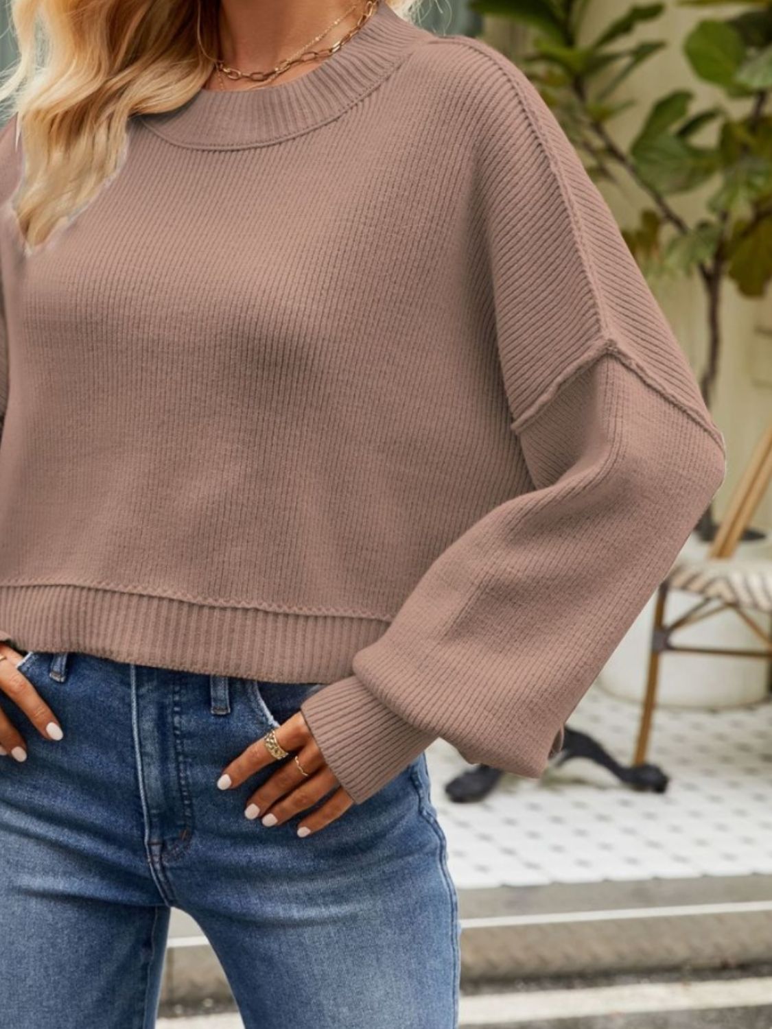 Boxy ribbed knit sweater in taupe with crew neck and dropped shoulders.