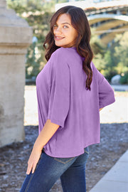 Lavender boxy dolman crop t-shirt with short sleeves and a relaxed fit.