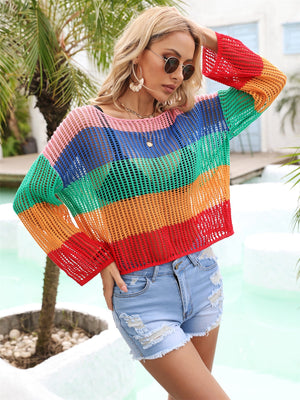 Rainbow mesh cover-up with flared sleeves in pink, blue, green, orange-red, and red stripes.