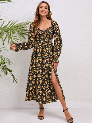 Black floral print midi dress with tie-front and slit.