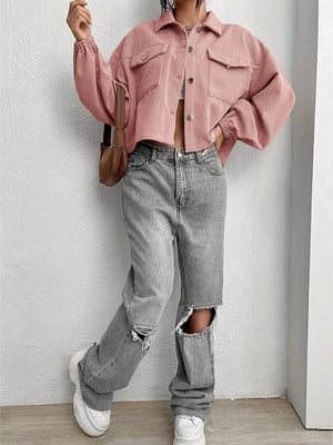 Pale blush corduroy blouson jacket with button front and chest pockets.