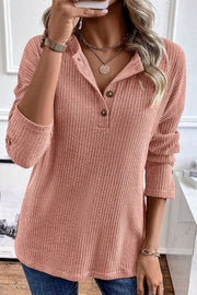 Dusty Pink ribbed knit henley top with button detail and relaxed fit.