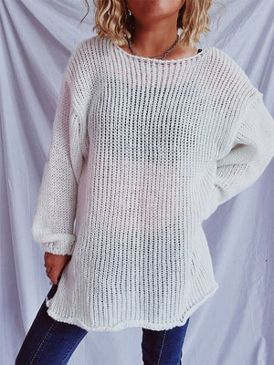 White open-knit slouchy boatneck sweater with long sleeves.